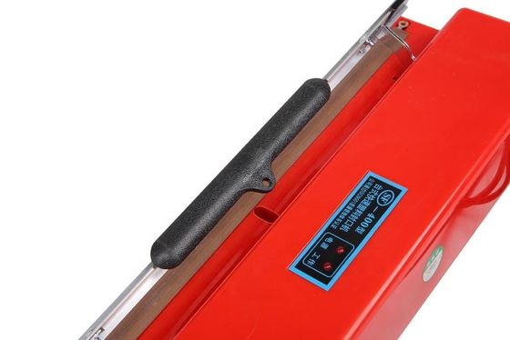 Elektrisch aangedreven SF-400 roodkleurige plastic film handverzegelende verpakkingsmachine voor huishoudens